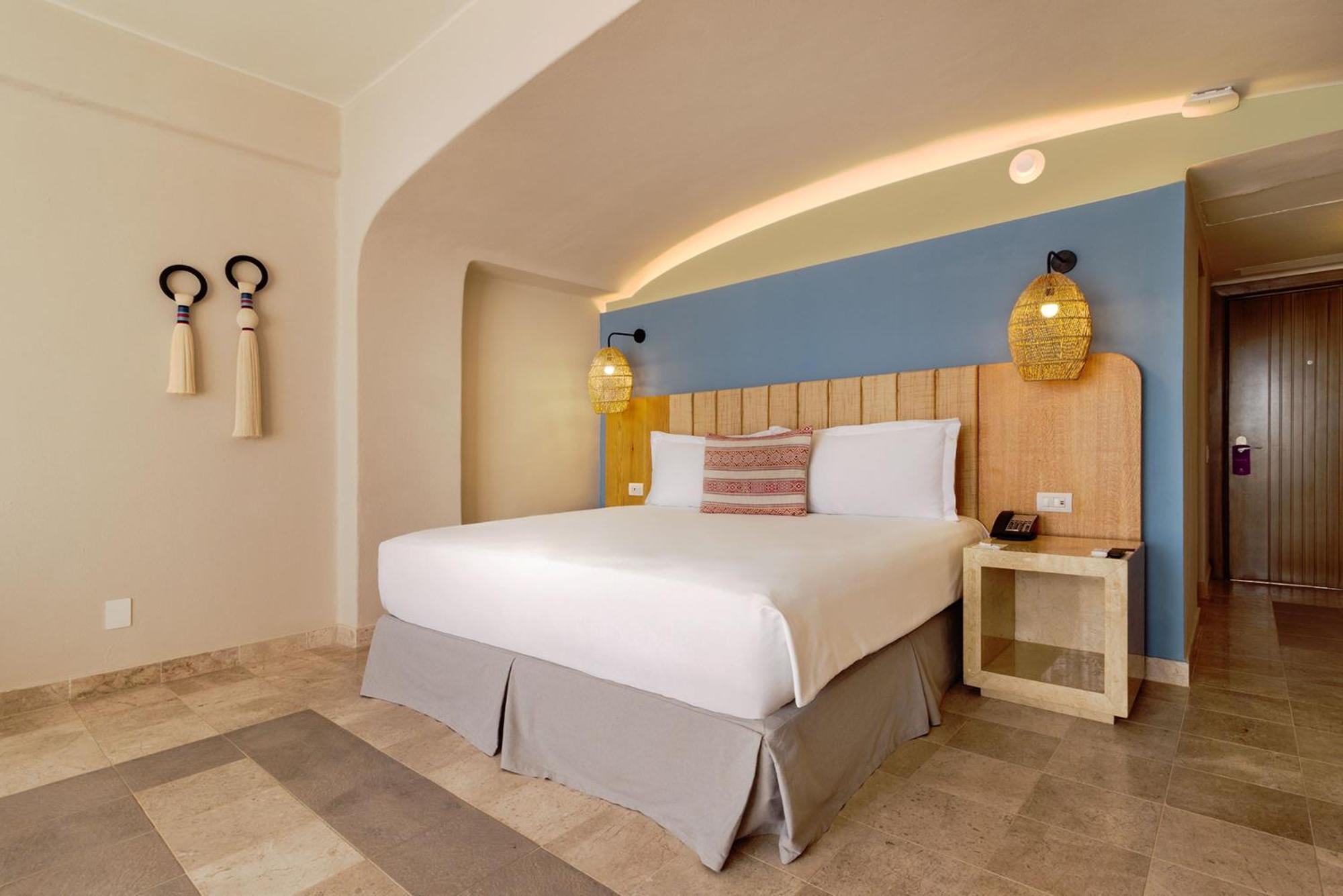 Hotel Camino Real Acapulco Diamante Exterior foto A bedroom at the Iberostar Grand Hotel at Playa Paraíso, Tenerife